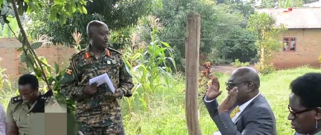 Shocking!! Video Of Museveni’s Minister Slamming A Top UPDF Boss In Public Leaves Ugandans – Bullets Flare Up