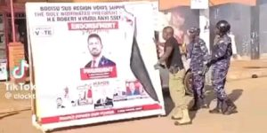 Much Hatred!! Mbale Police Boss Filmed Tearing Bobi Wine’s Poster – Shooting NUP Supporters Live – Police Launches Investigations